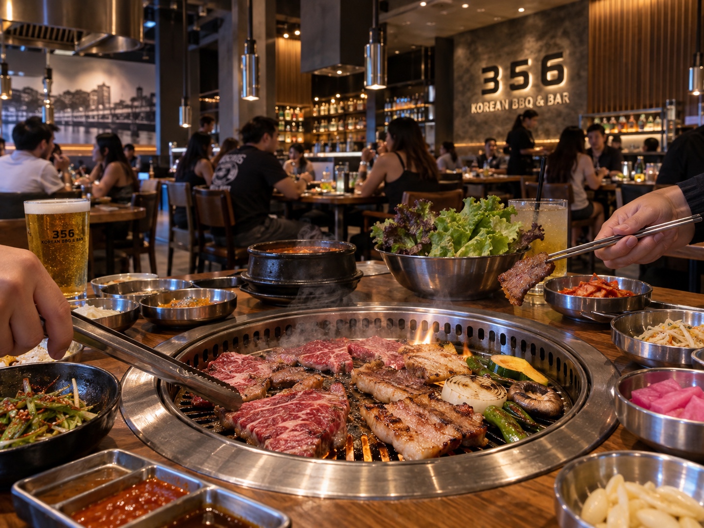 Meat and vegetables cooking on the tabletop grill inside 356 Korean BBQ in Mission Valley