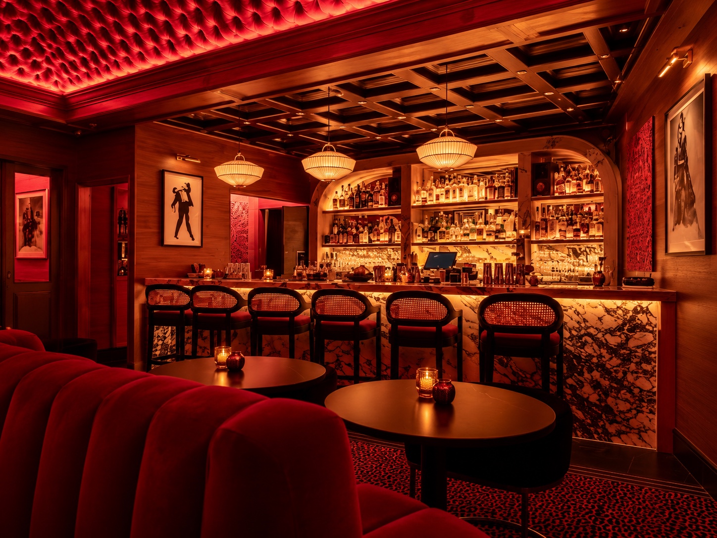 The red velvet lounge and illuminated marble bar inside Beatons in Palm Springs