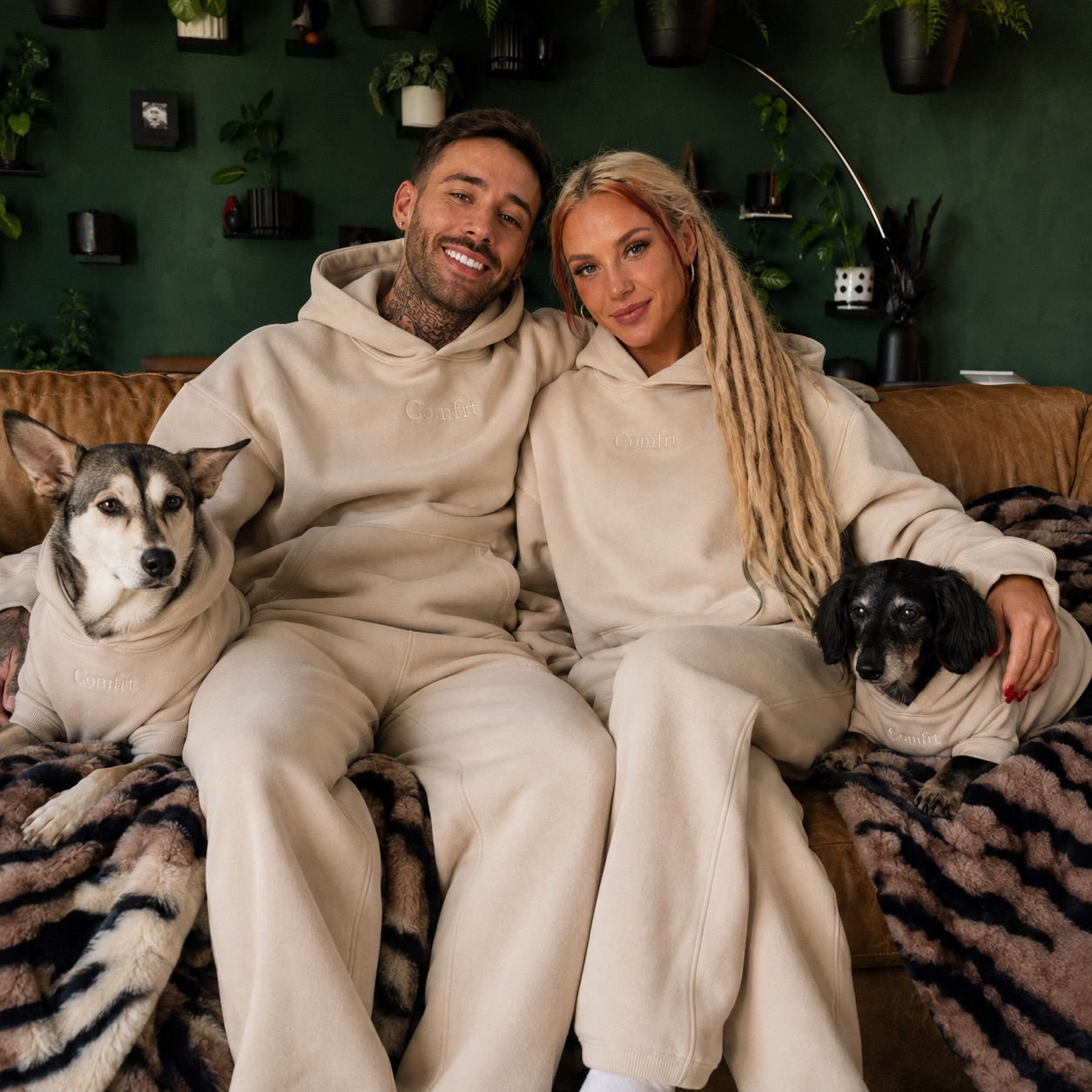 Lana and Kyle wearing Comfrt with their dogs