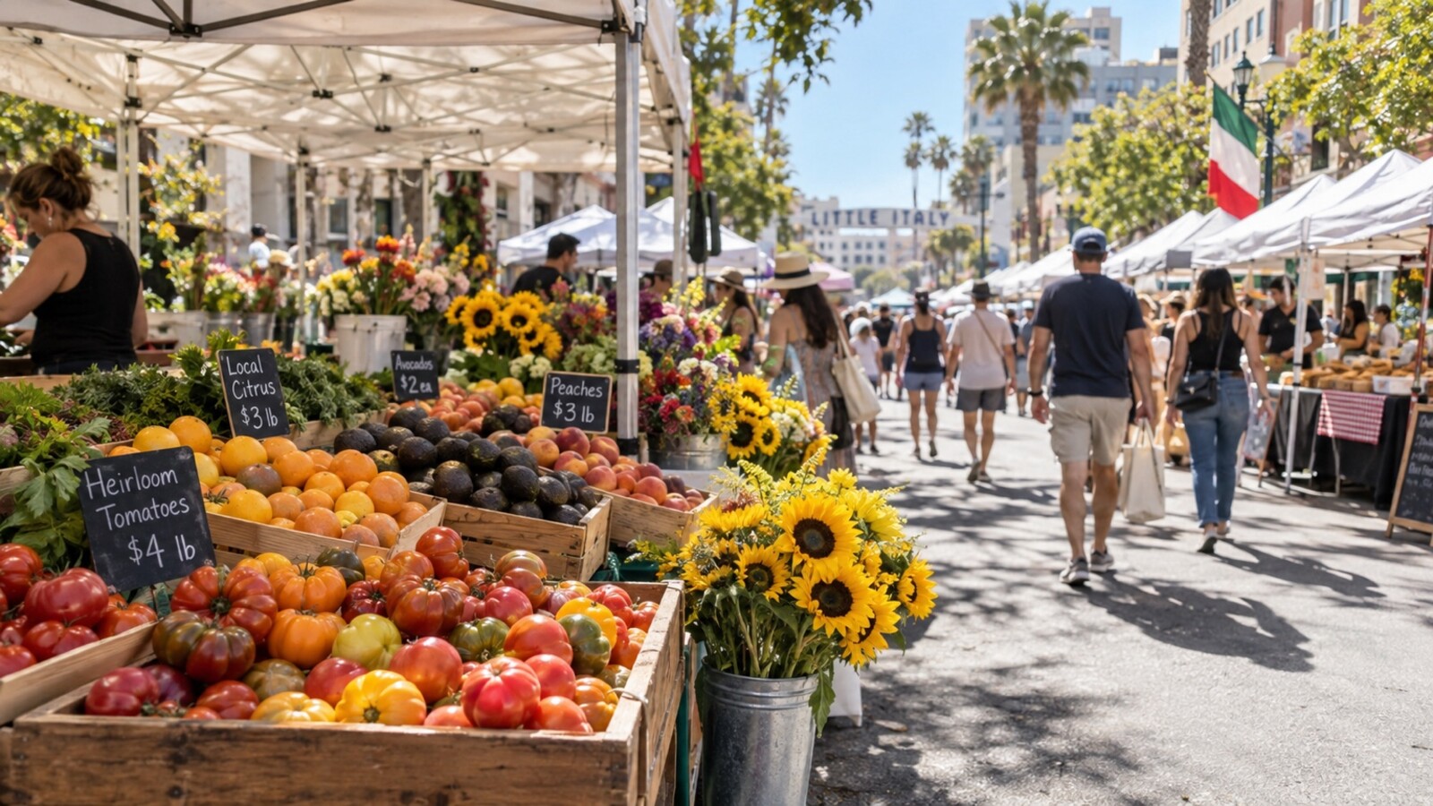 Little Italy Mercato tents lining Date Street on a sunny San Diego morning