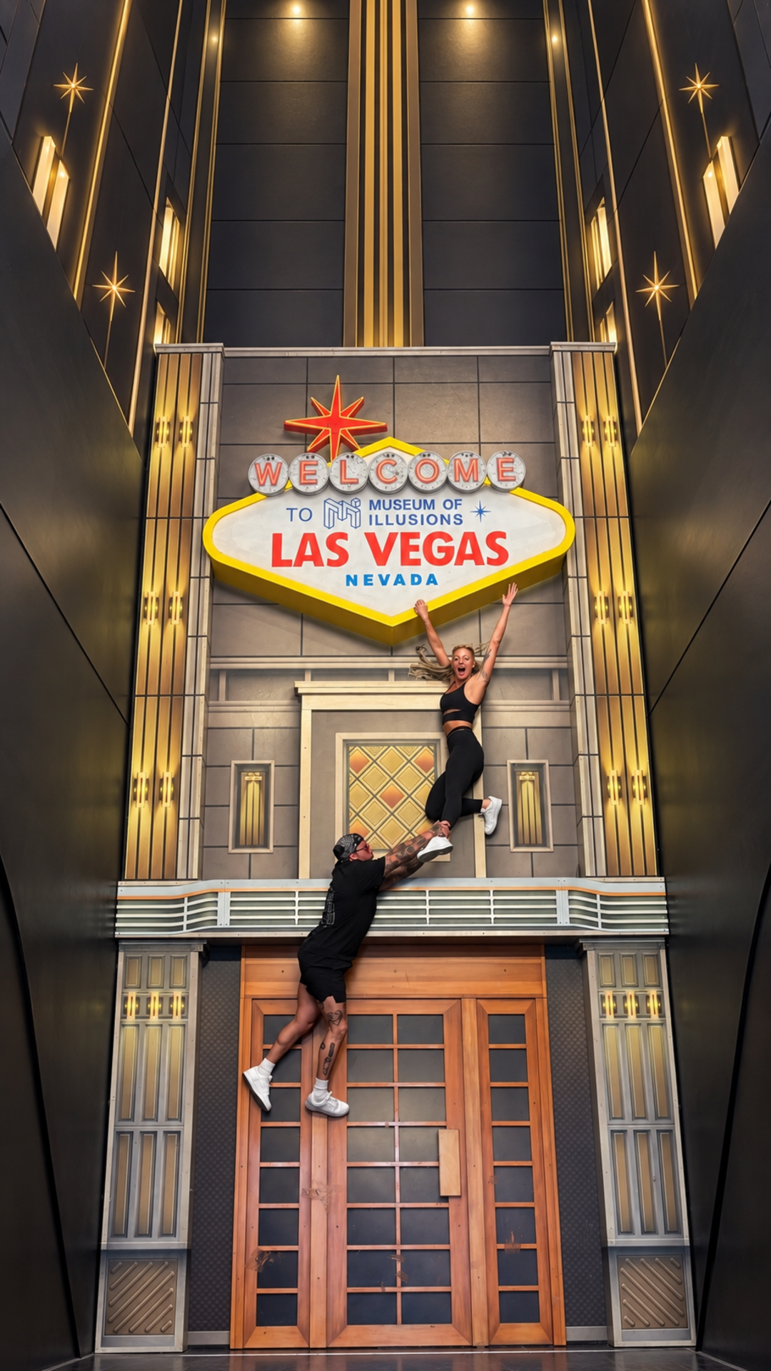 Lana and Kyle appearing to hang from a building at Museum of Illusions Las Vegas